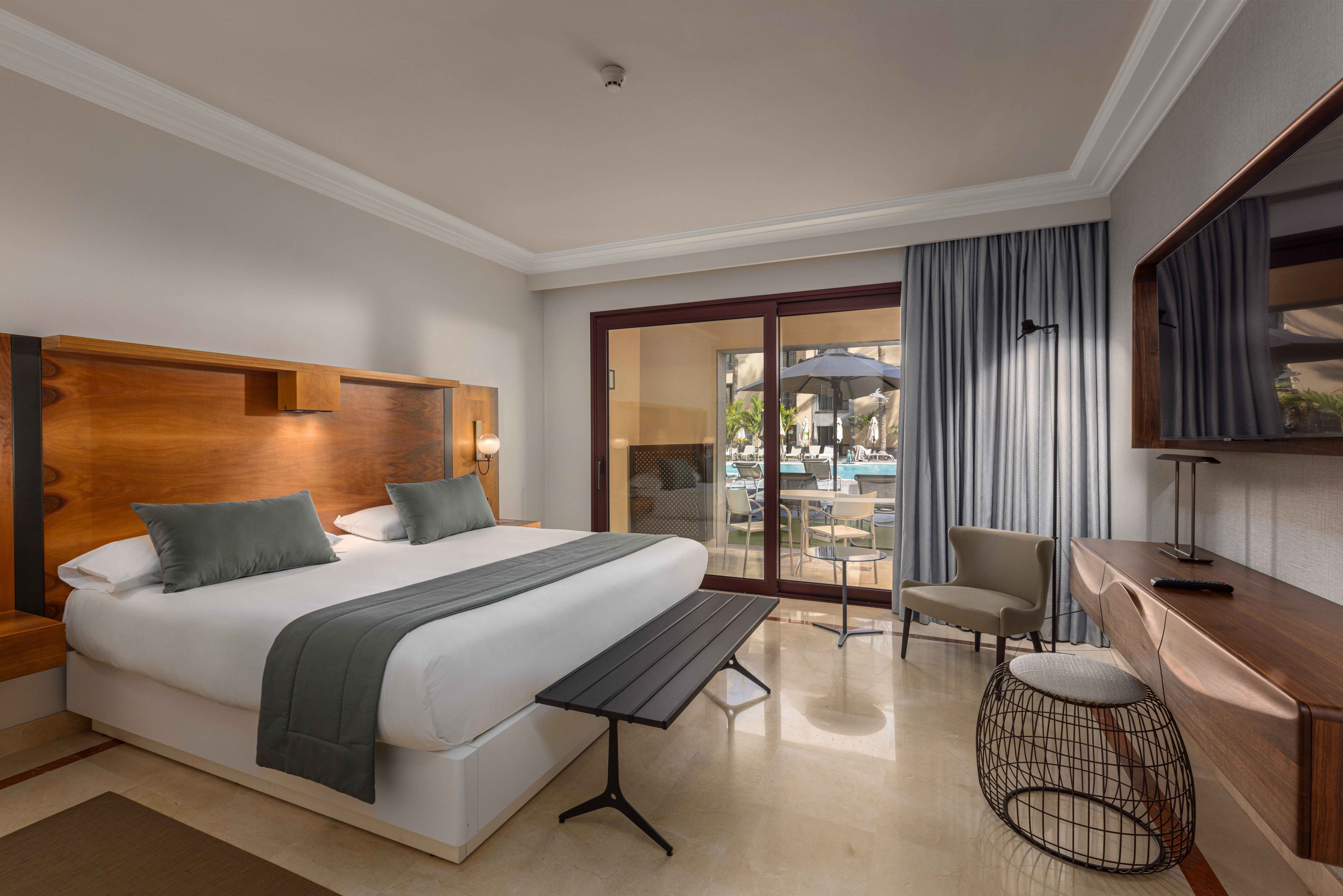 cama habitación doble deluxe terrace lopesan costa meloneras resort & spa