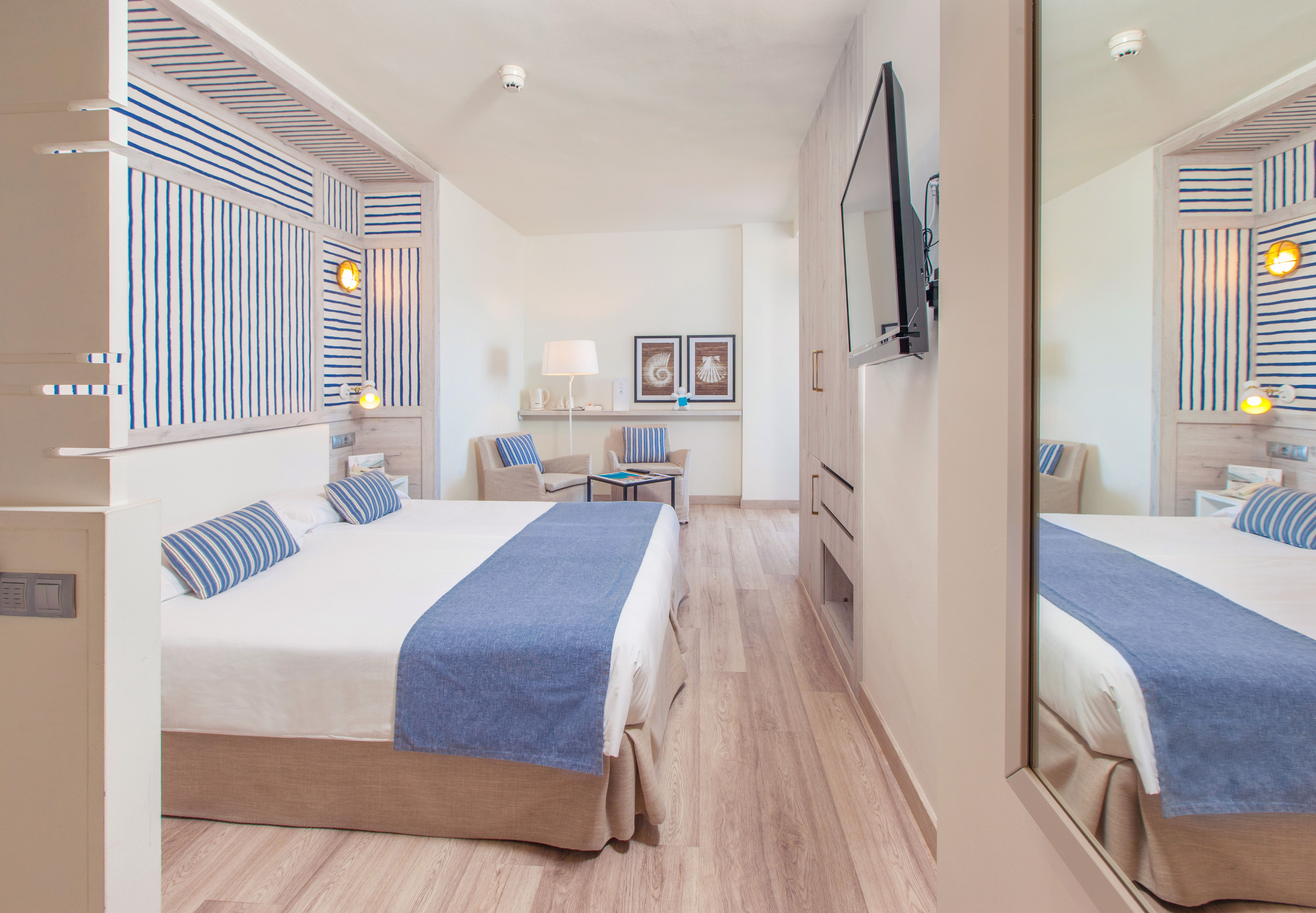 cama habitación doble estándar vista corallium beach by lopesan hotels
