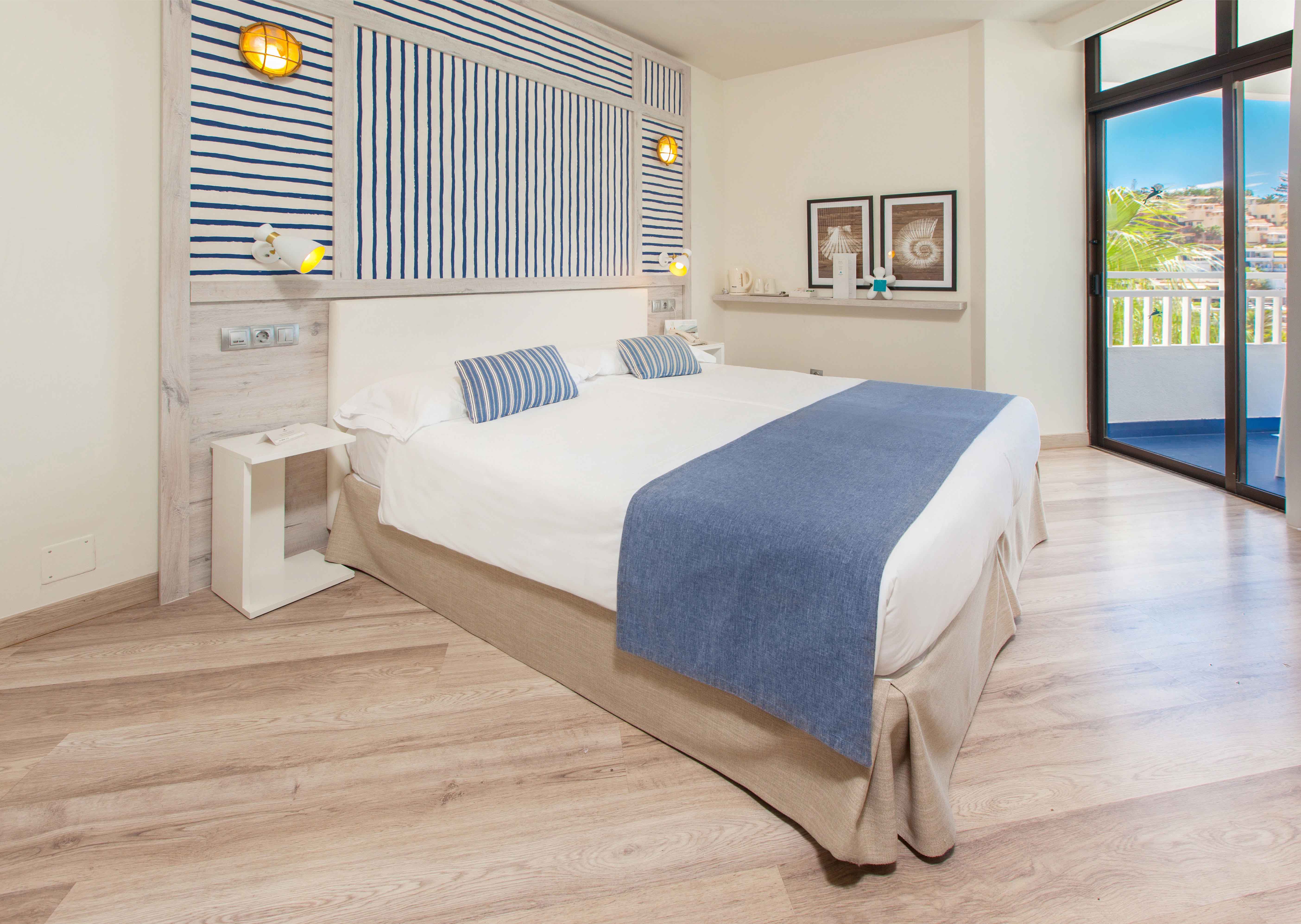 cama senior suite corallium beach by lopesan hotels