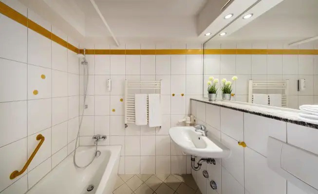 fotos bano habitaciones hotel ifa fehmarn apartamento familiar
