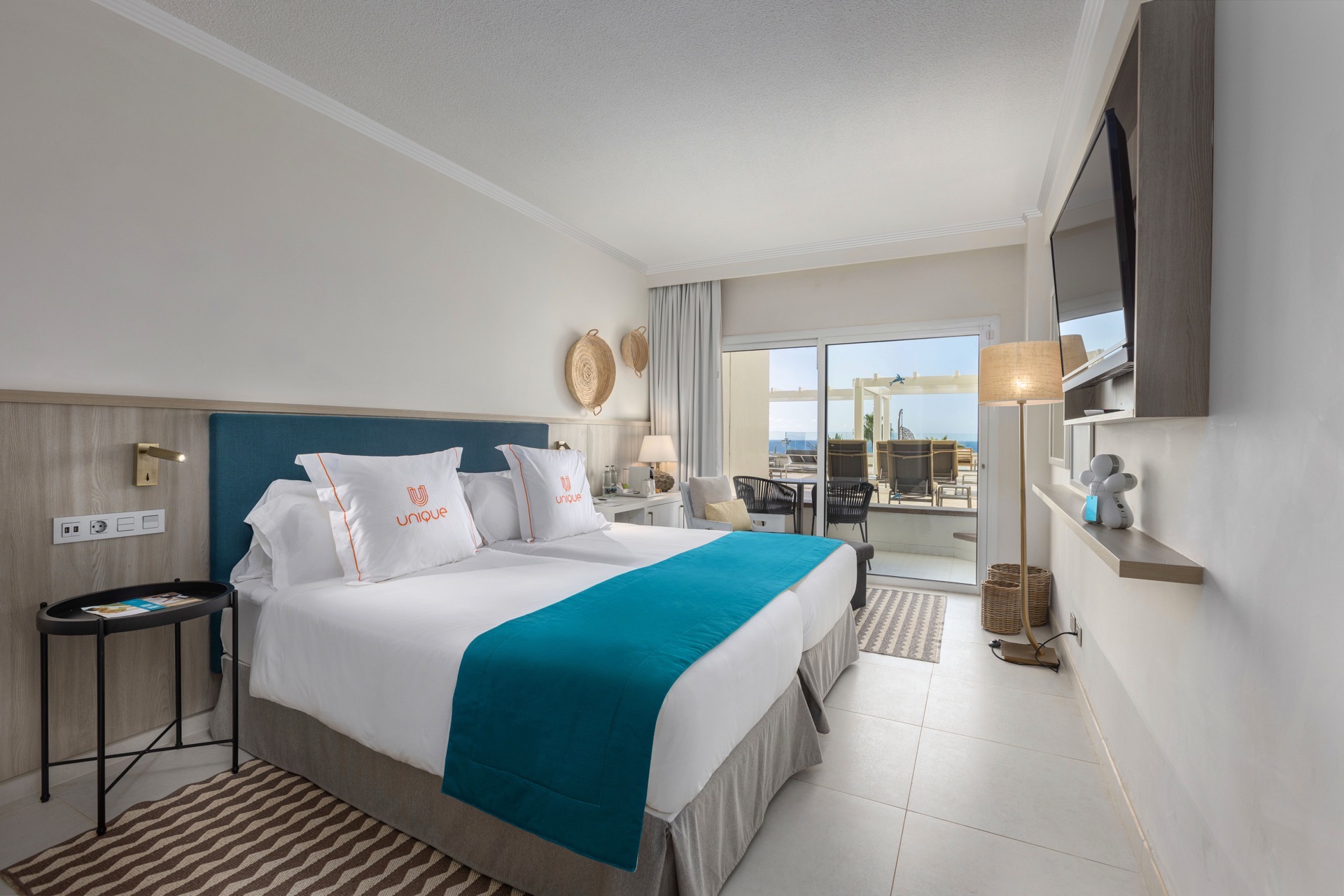 cama habitación unique solarium corallium dunamar