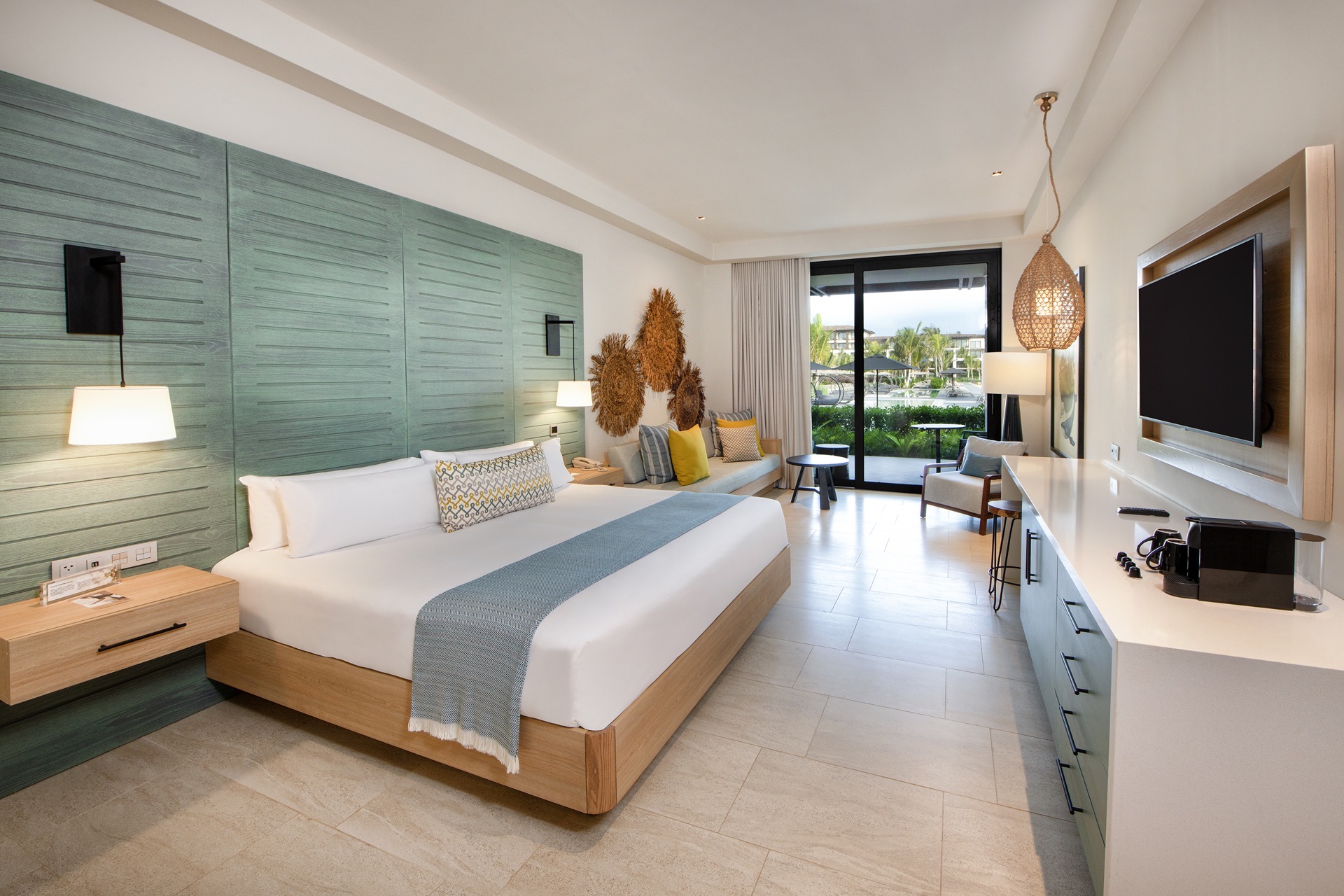 cama resort king pool view junior suite lopesan costa bavaro resort spa & casino