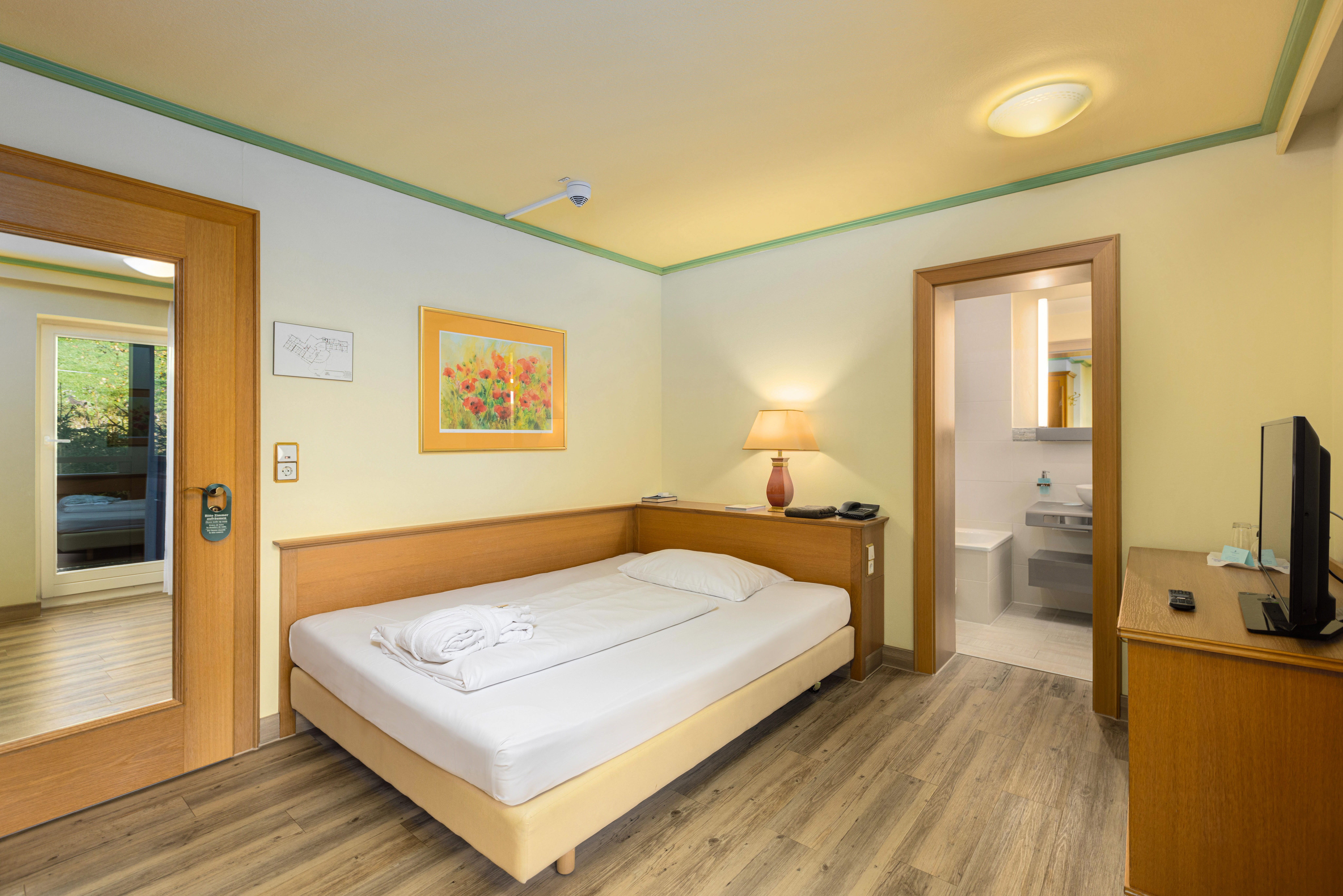 cama habitación individual grand lit hotel ifa alpenhof wildental