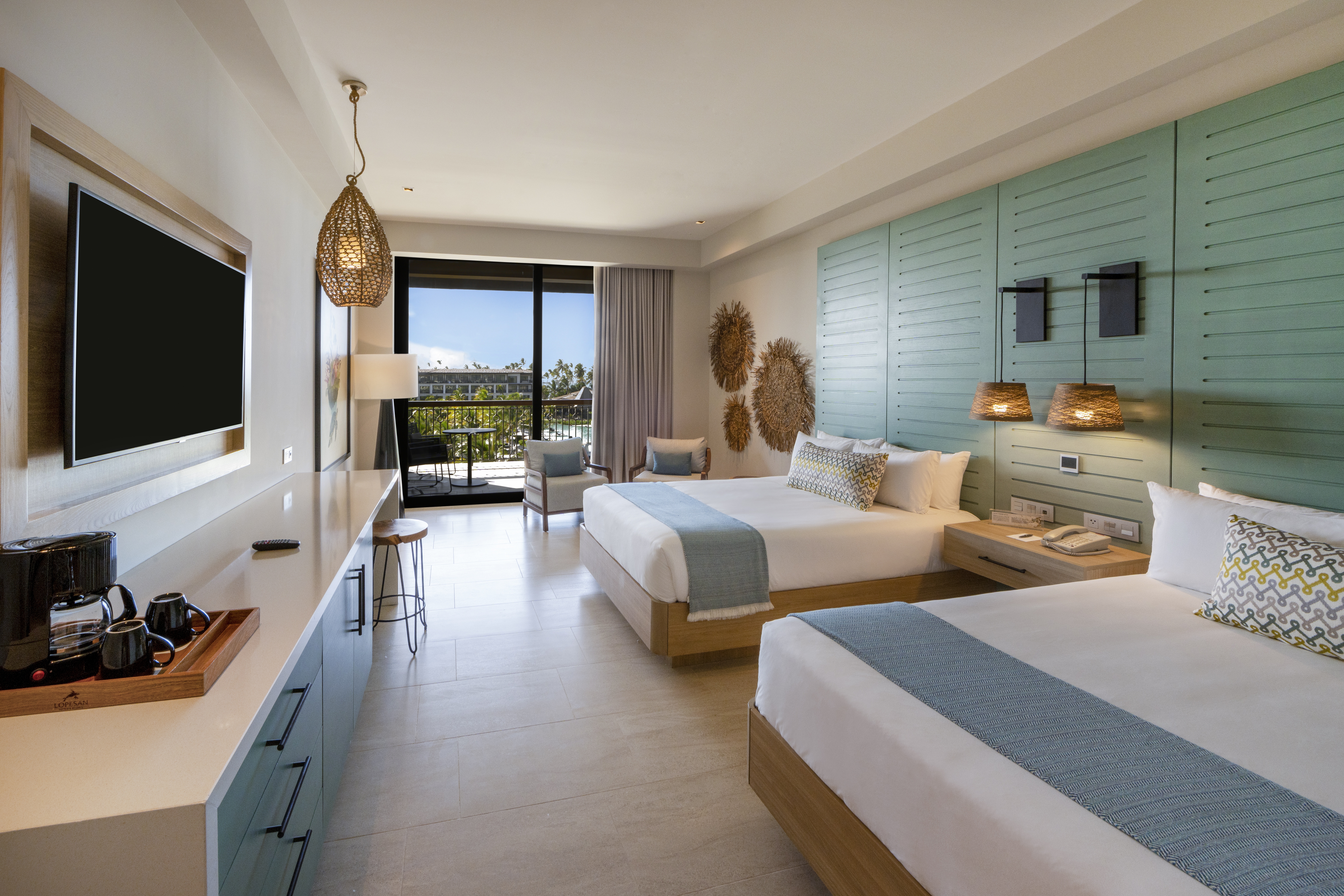 cama resort queen ocean view junior suite lopesan costa bavaro resort spa & casino