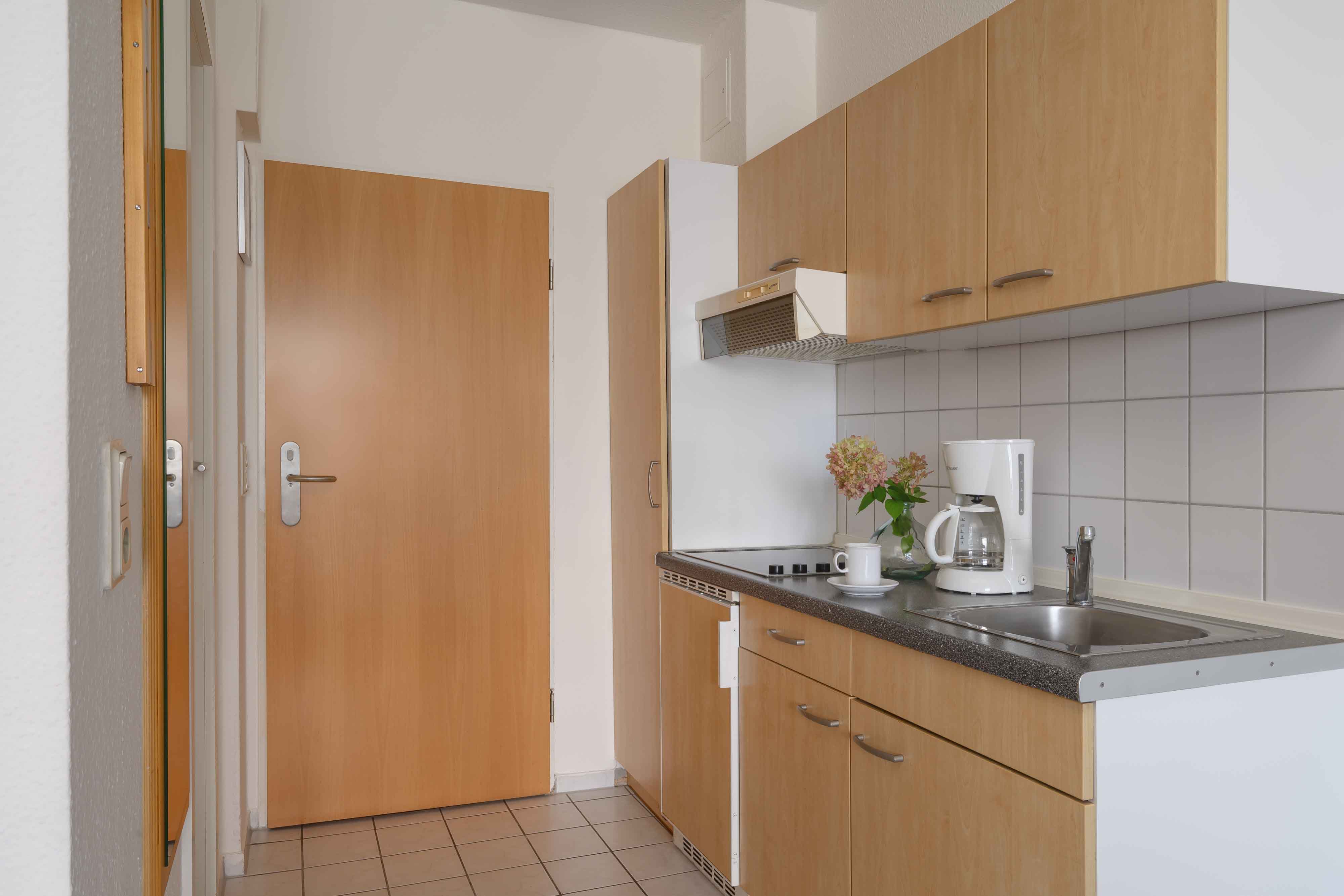 cocina-apartamentos-3-dormitorios-hotel-ifa-rugen